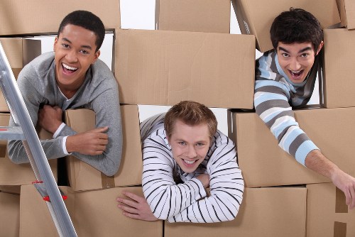 Office removals planning in Harlesden with moving boxes and desks