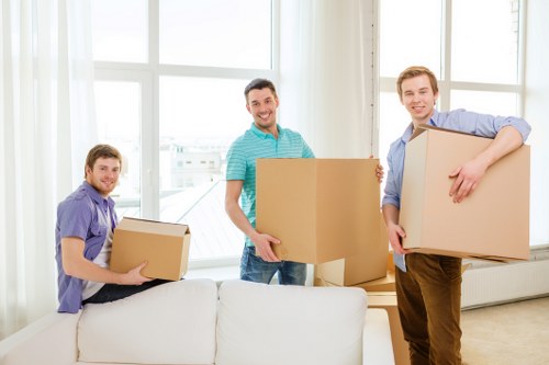 Professional movers handling belongings in Harlesden